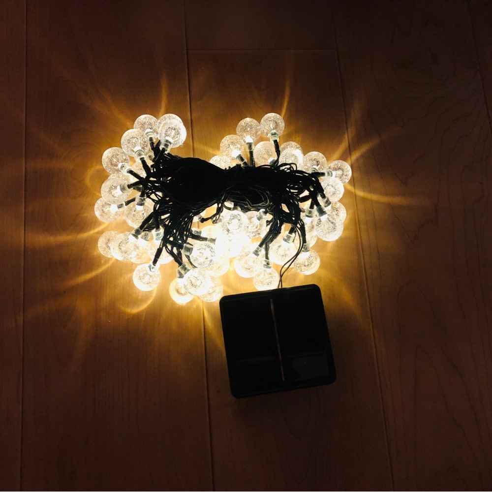 2 NWOT Solar Warm White String Lights - Round Bulbs. No battery or electricity
